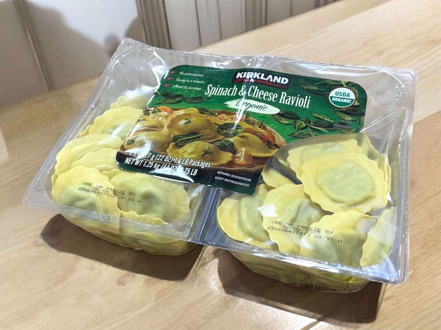 Organic spinach and cheese ravioli packaging by Kirkland Signature, perfect for convenient and nutritious meals.