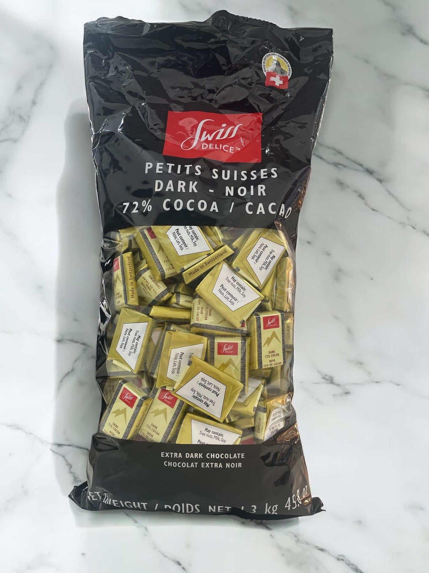 SWISS DELICE dark chocolate, 1.3kg bag, 72% cacao, Swiss origin.
