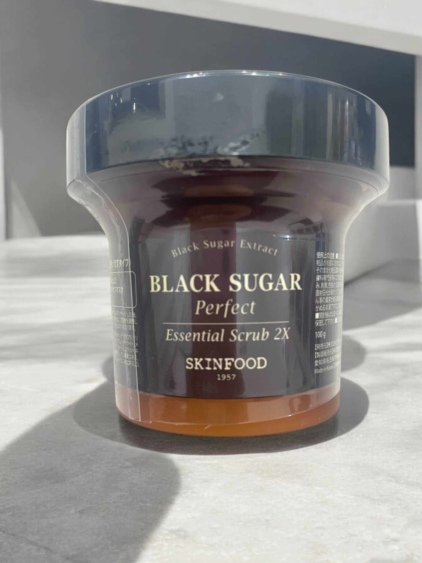 SKINFOOD Black Sugar Perfect Essential Scrub 2X 100ml jar for gentle exfoliation and smooth skin