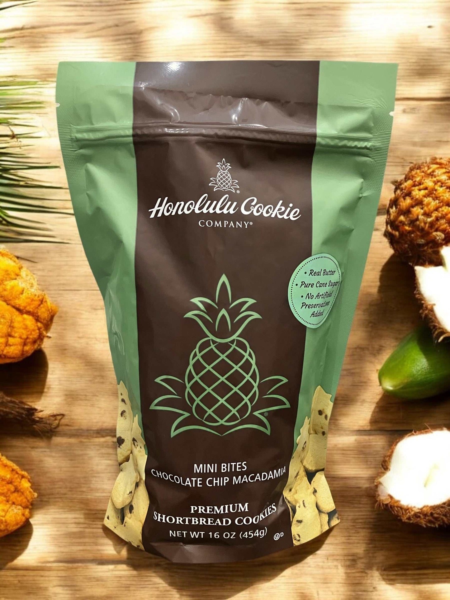 Pineapple-shaped mini cookies with chocolate chips and macadamia nuts in resealable stand-up pouch.