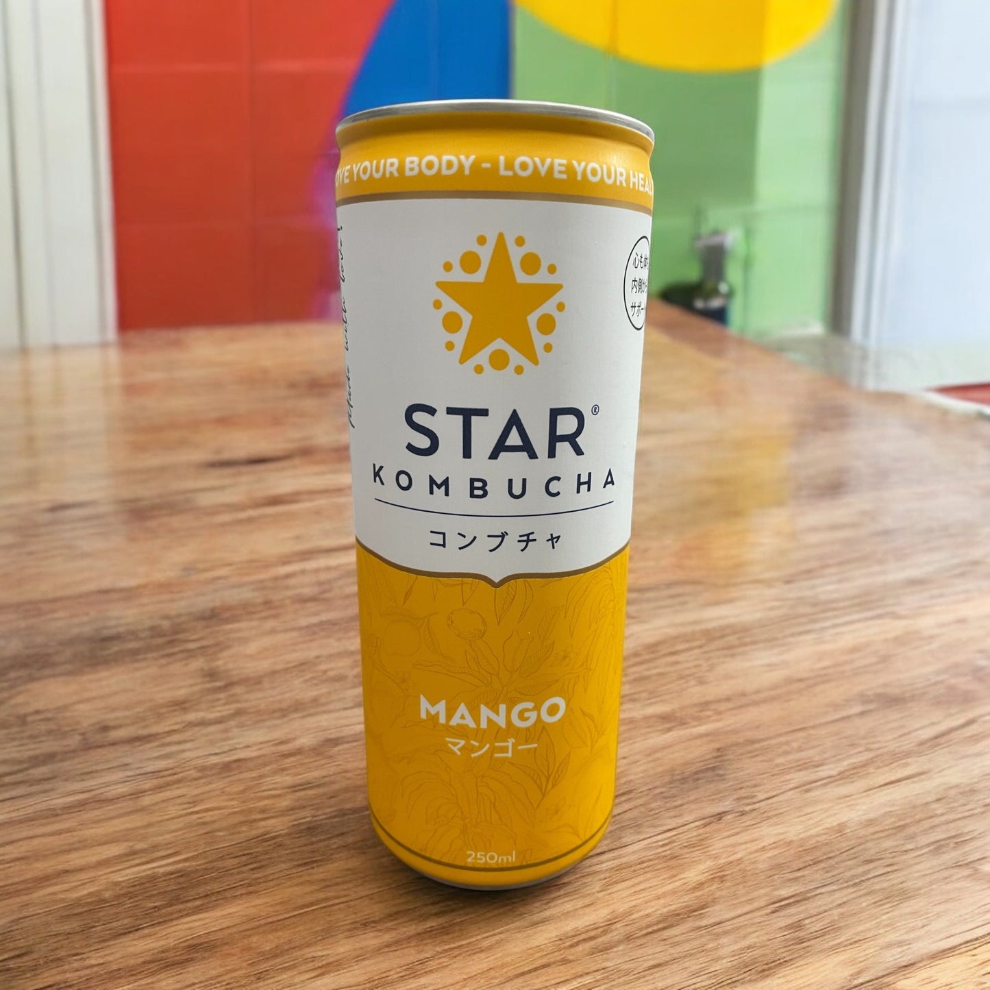 Mango-flavored Star Kombucha drink, 250ml can, fermented health beverage from Vietnam.