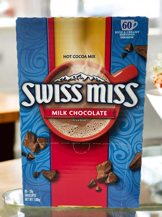 Swiss Miss Milk Chocolate Cocoa 60-Pack Box, creamy instant cocoa drink.