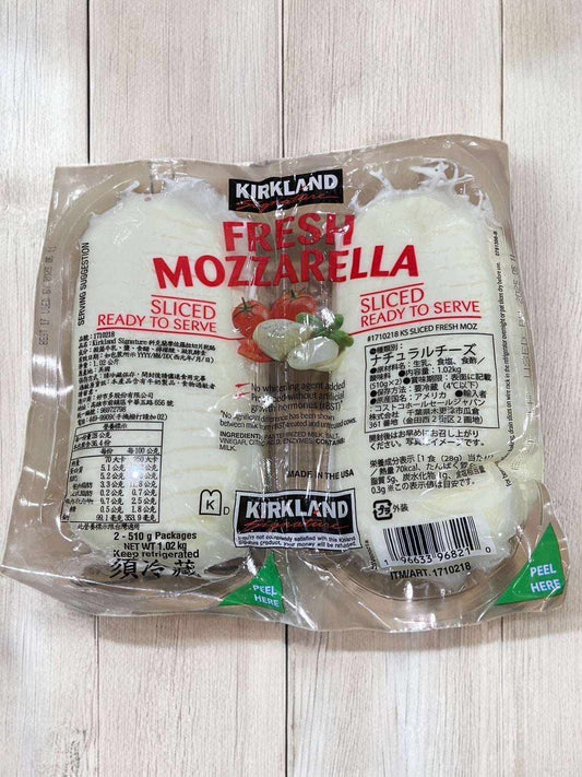 Sliced fresh mozzarella cheese by Kirkland Signature, ideal for salads and pizzas, 510g x 2 packs.