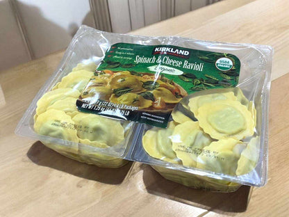 Organic spinach and cheese ravioli packaging by Kirkland Signature, perfect for convenient and nutritious meals.