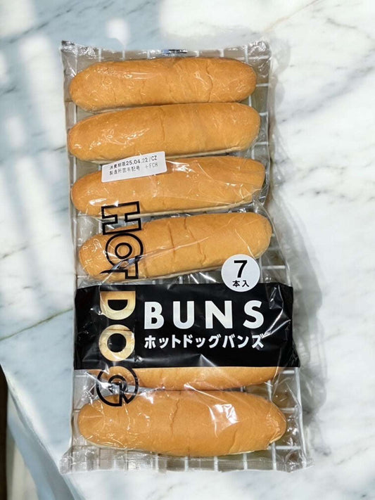 HOT DOG BUNS packaged on a marble surface, featuring a set of seven buns.