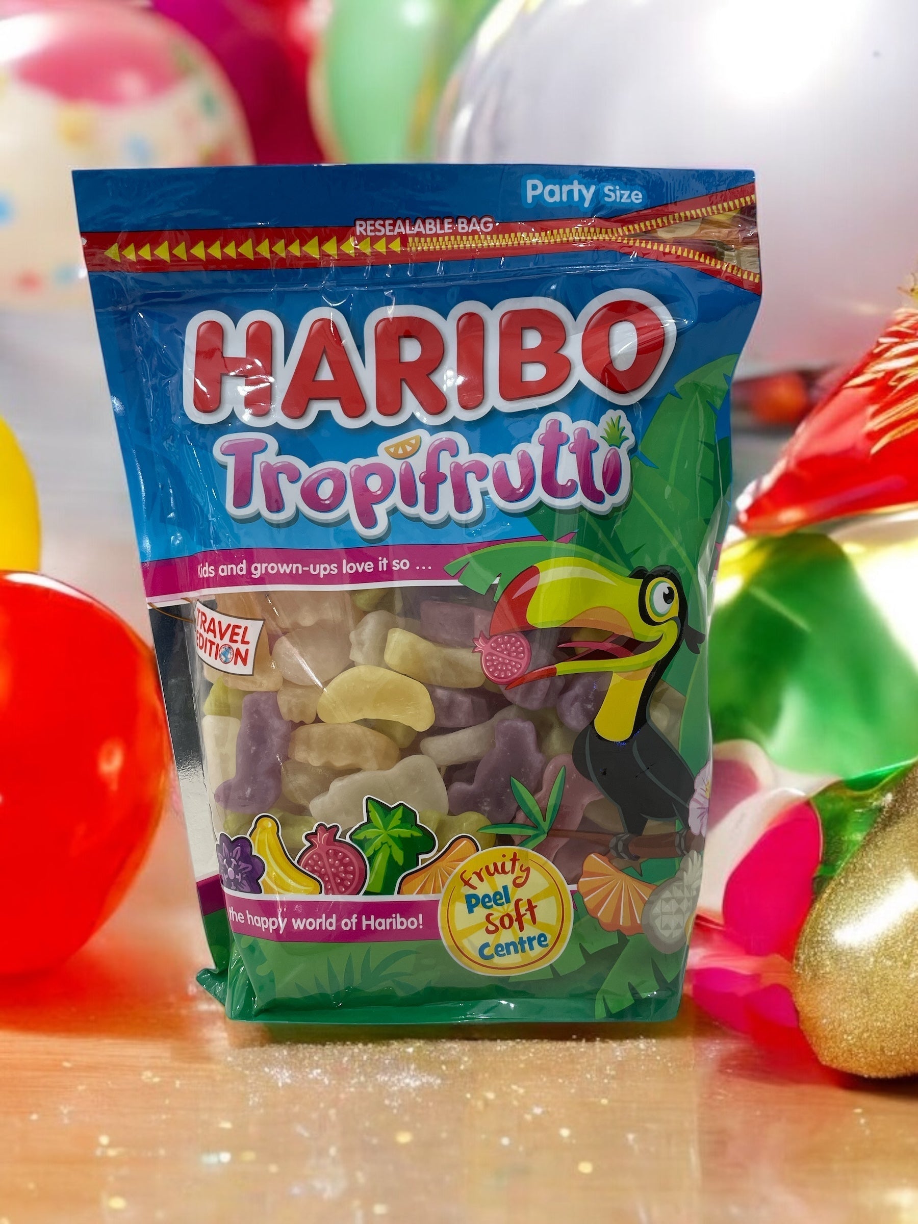 HARIBO tropical fruit gummy candy mix, 750g bag with passion fruit, pineapple, banana, melon, mango, mandarin, and cassis flavors.