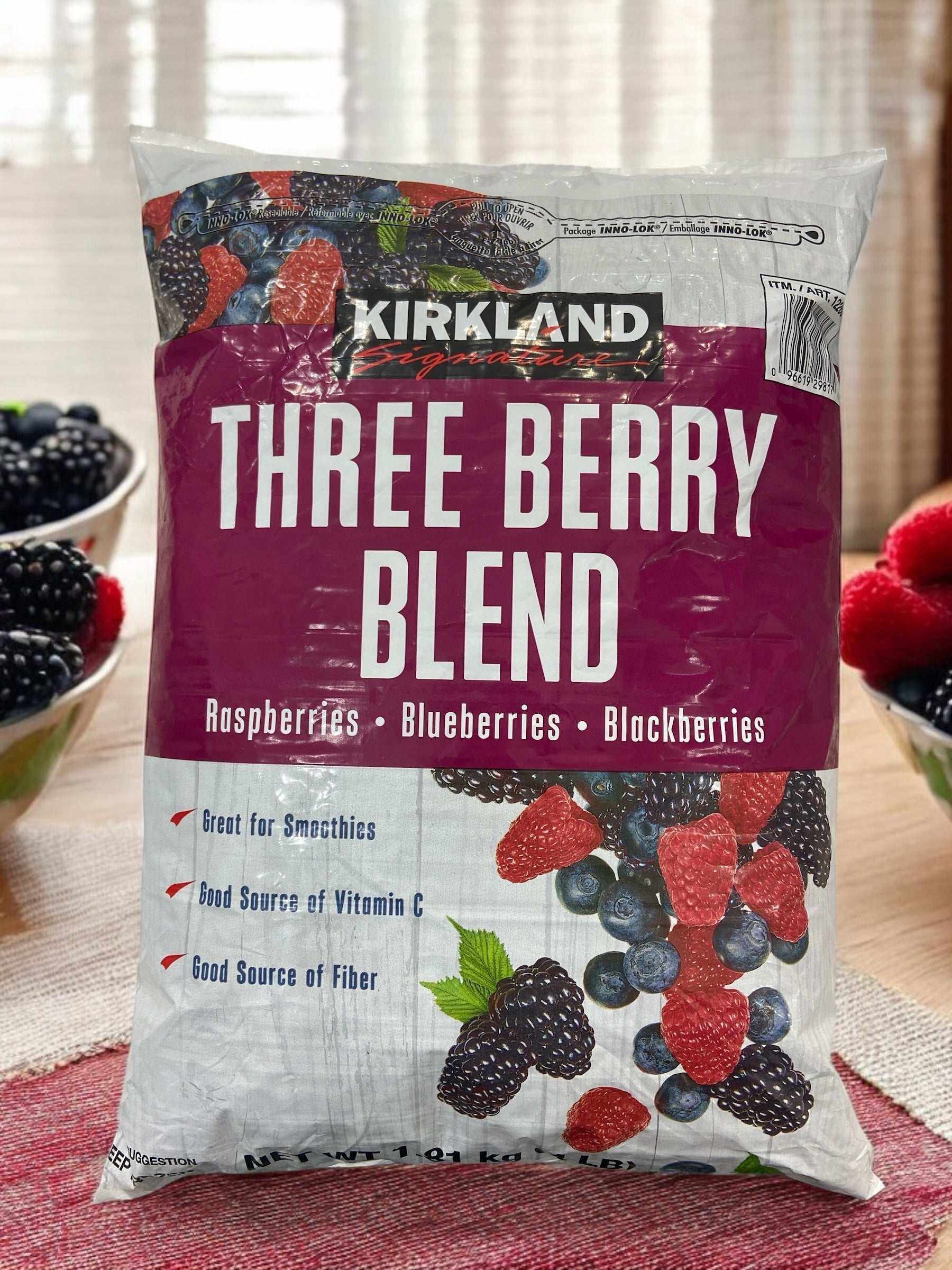Kirkland Signature frozen three berry blend pack with raspberries, blueberries, and blackberries, 1.81kg, ideal for smoothies and rich in vitamin C and fiber.