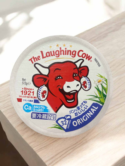The Laughing Cow Original creamy spreadable cheese 32 pieces 512g refrigerated product with red laughing cow logo French cheese