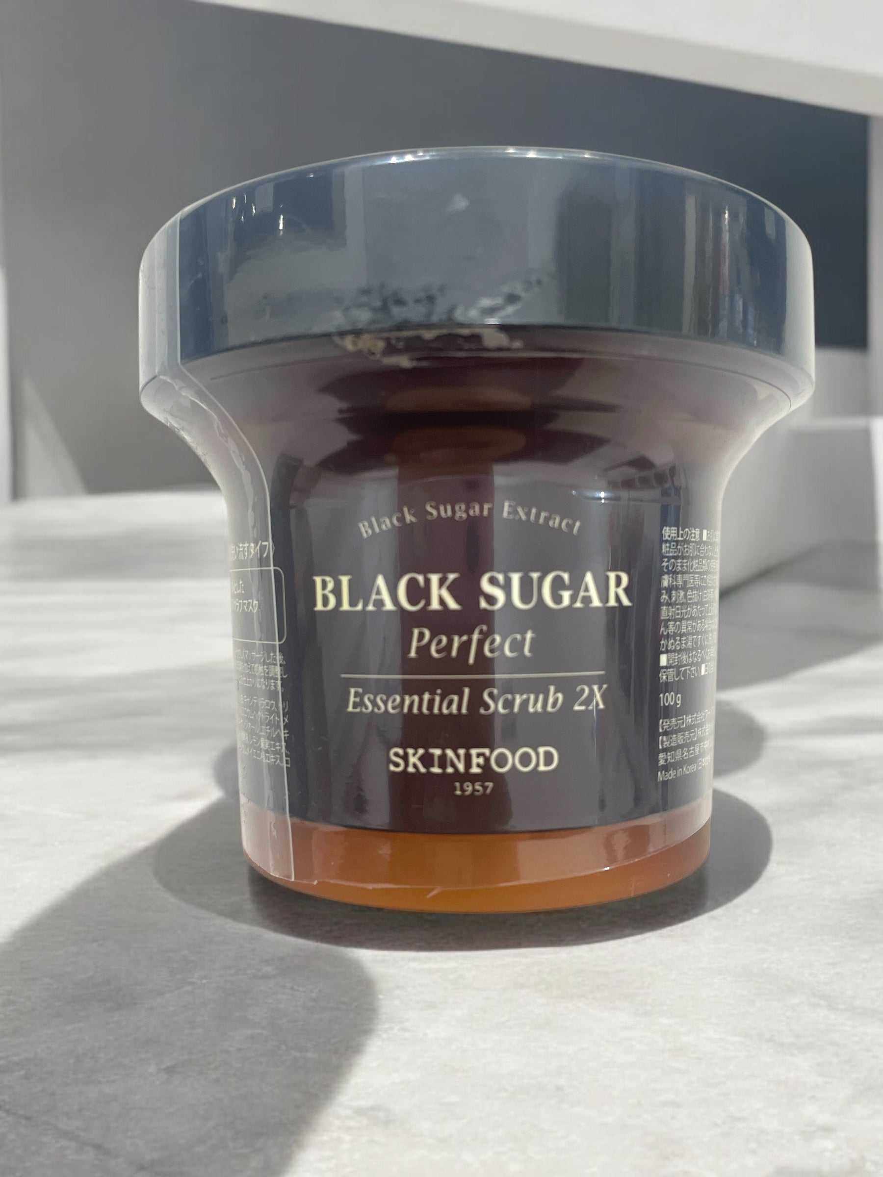 SKINFOOD Black Sugar Perfect Essential Scrub 2X 100ml jar for gentle exfoliation and smooth skin