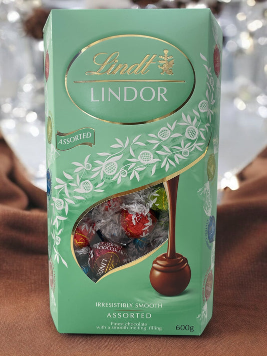 Lindt Lindor Green Assortment with Milk, Pistachio, Salted Caramel, and Double Chocolate.