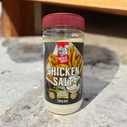 NICE N TASTY Chicken Salt 700g seasoning bottle on a stone surface, herb and spice blend.