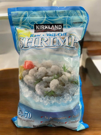 KS Frozen Raw Tail-Off Shrimp 50-70 count peeled with no preservatives on ice in Kirkland packaging