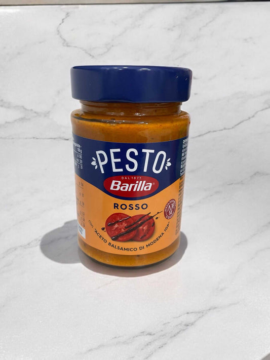 Barilla Rosso Pesto Pasta Sauce 190g jar with balsamic vinegar, tomato, and Grana Padano cheese.