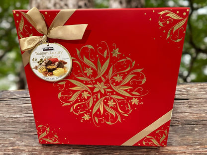 Kirkland Signature Belgian Chocolate Assortment Box, 46 pieces, in red packaging with gold accents.