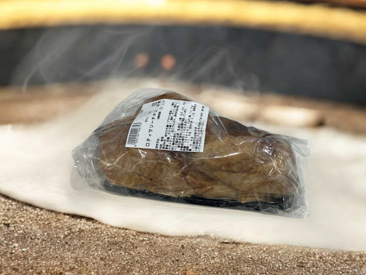 Half Rotisserie Chicken in packaging, popular Costco item.