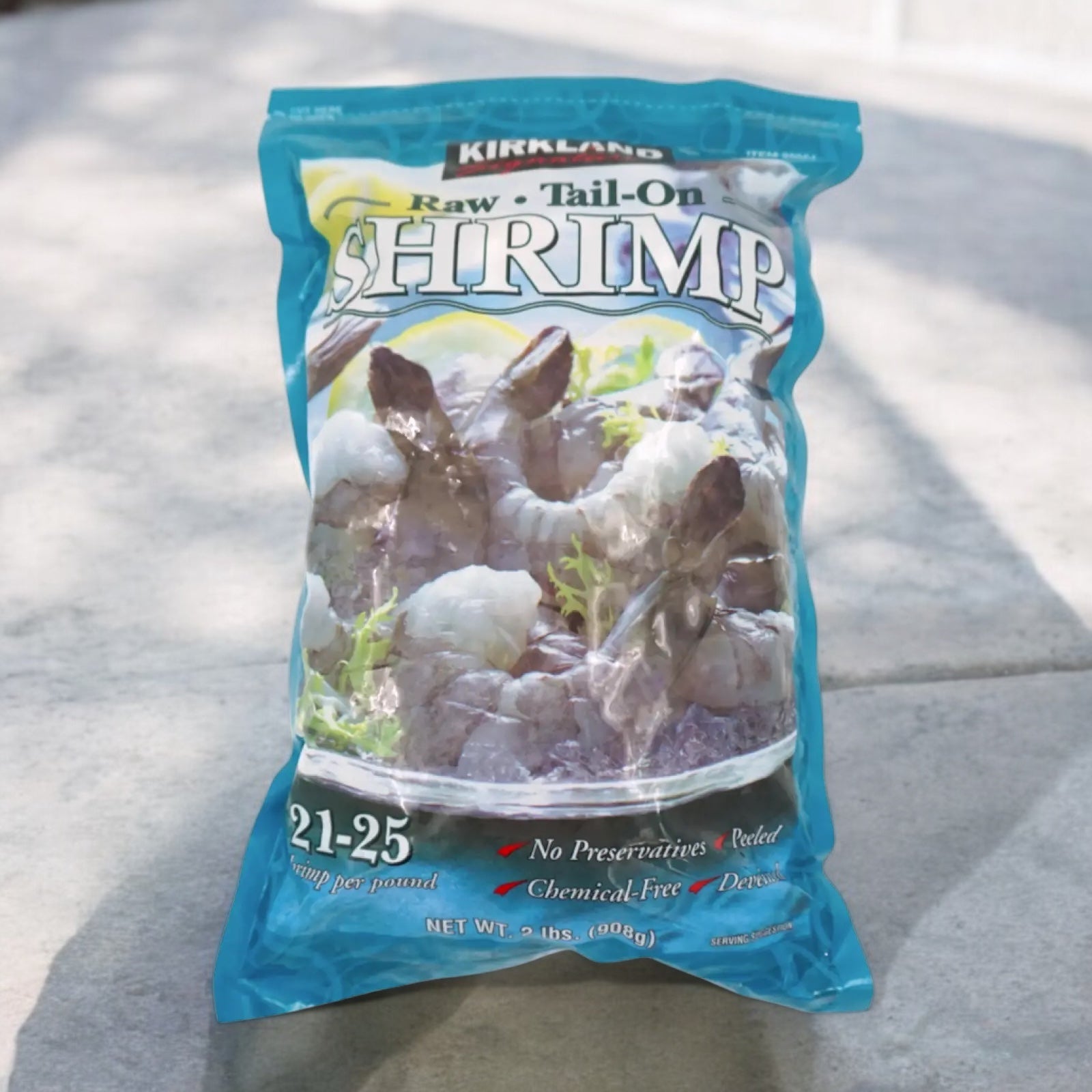 KS SHRIMP frozen peeled tail-on raw shrimp, no preservatives, size 21-25, 908g bag.